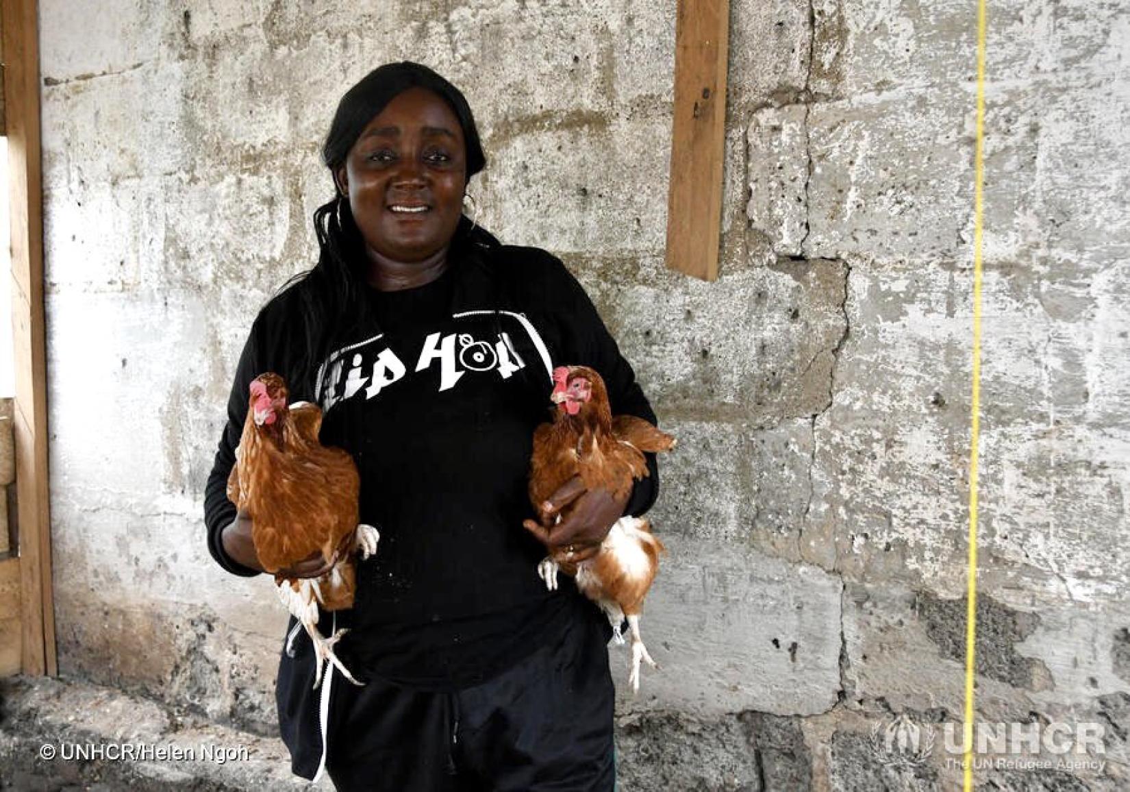 Beneficiary of project, mini egg poultry by UNHCR/FAO