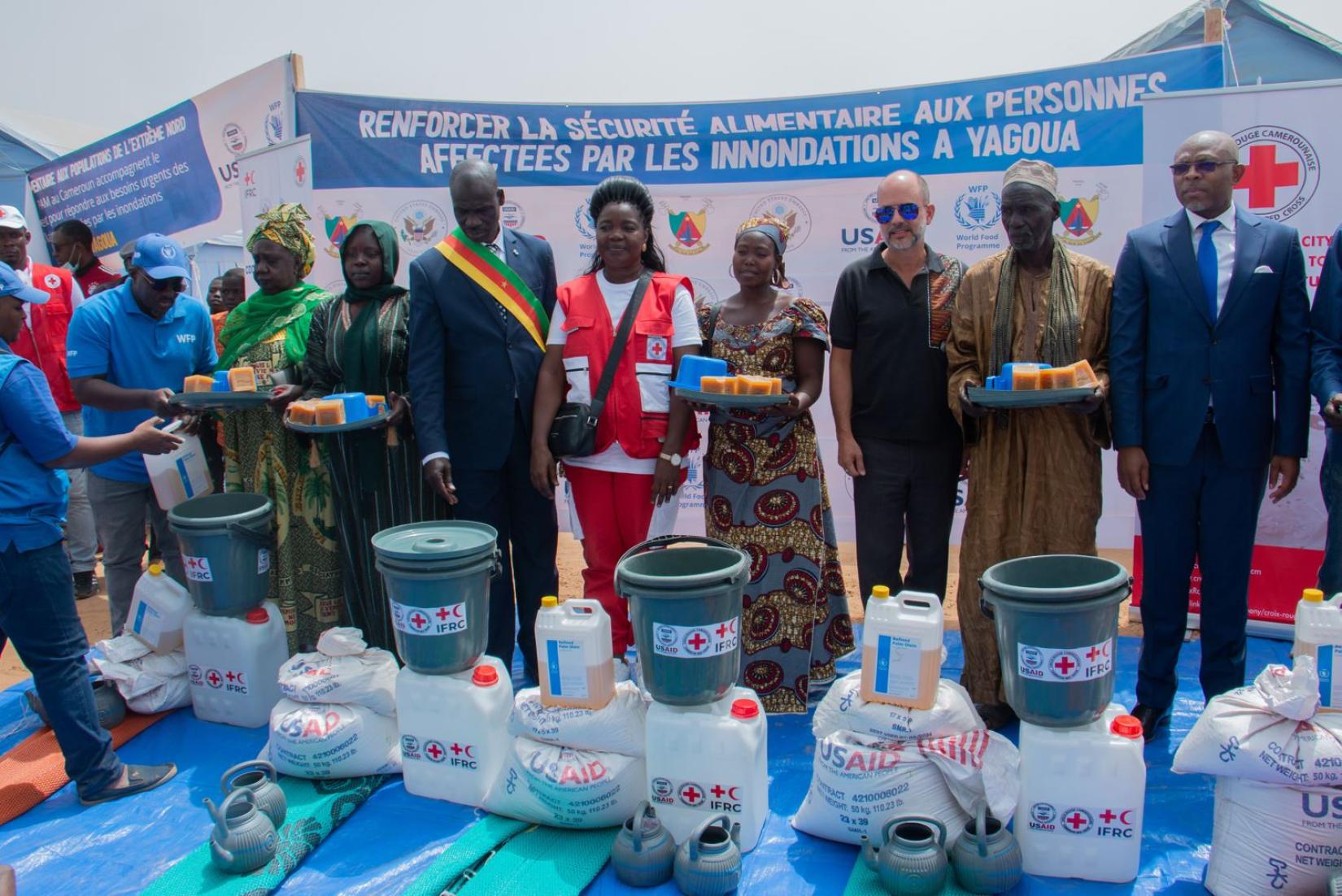 People displaced by floods receive food assistance from WFP and red cross supported by USAID in Yagoua