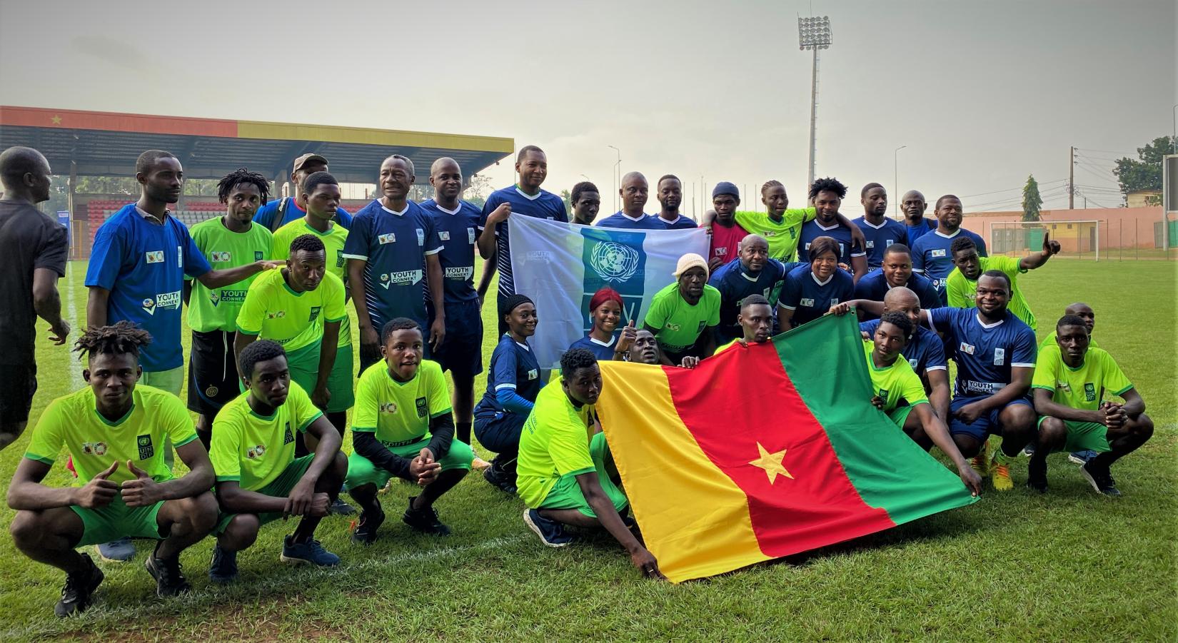 A cross-section of gender-inclusive football teams, at the start of the friendly match between the street youths and staff of UNDP  