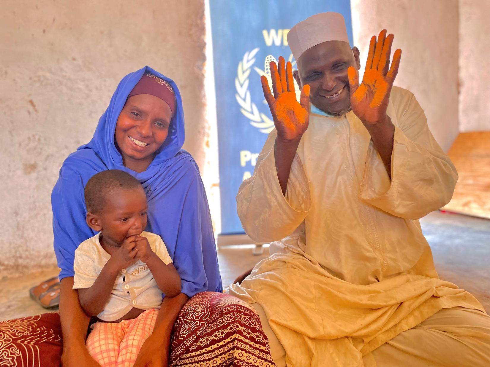 Abdoulaye Djibrilla with his wife and son