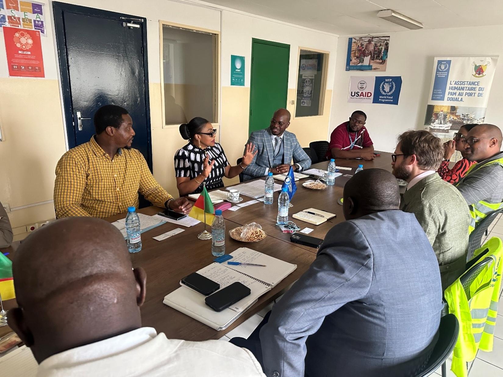 The Deputy Regional Director of WFP Regional Bureau in Dakar, Ms.Evelyn Etti discussing operational challenges and opportunities for enhancing the efficiency of WFP’s logistical operations at the Port of Douala with representatives from AGL group and CAMRAIL