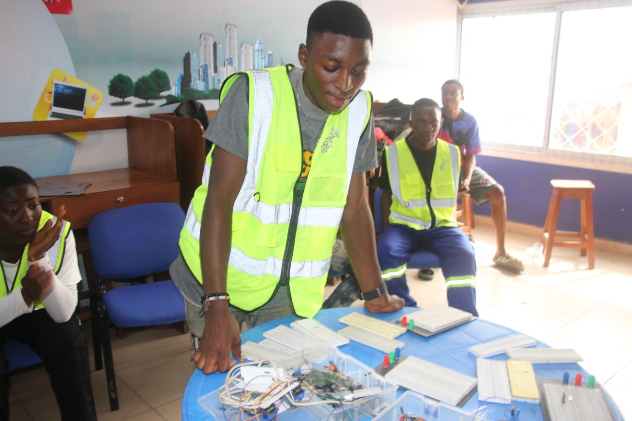 Millitius attending electronics class